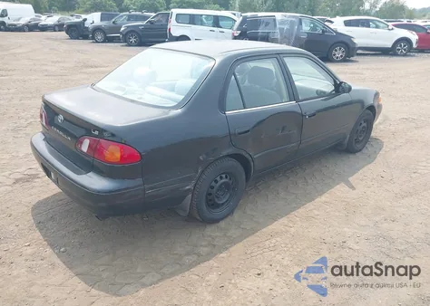 2000 Toyota Corolla Le from USA, damaged, VIN 2T1BR18E2YC293406